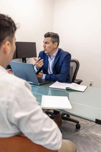 Engineers doing a consulting session in an white office